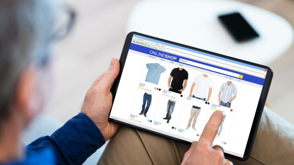 A person shops online on their tablet, demonstrating e-commerce trends and seamless navigation.