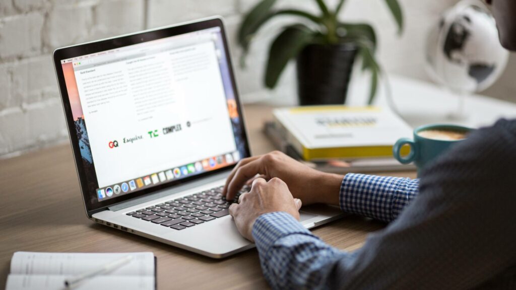 Newsletters are displayed in a person's inbox on a laptop.